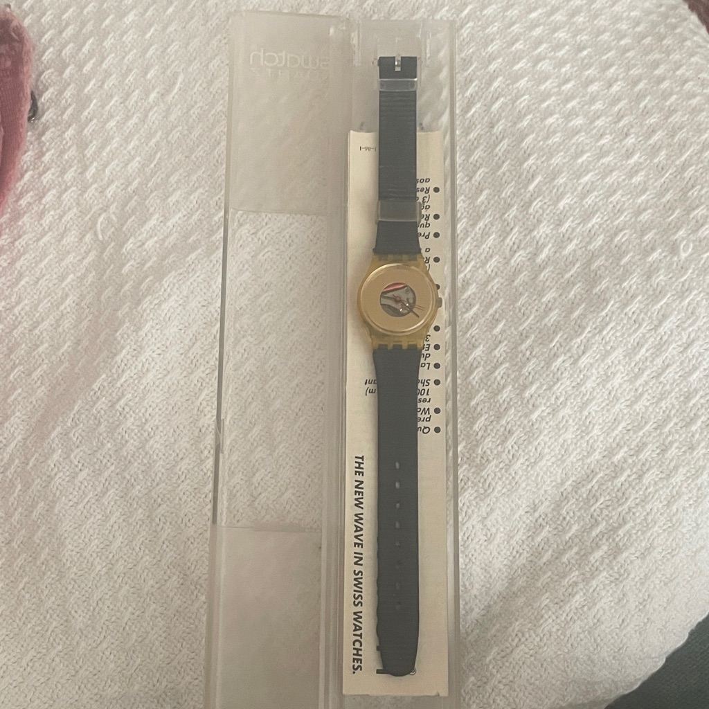 Swatch Gold Case With Black Strap Watch